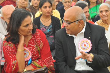 Two people chatting at Soma Yagna London 2026